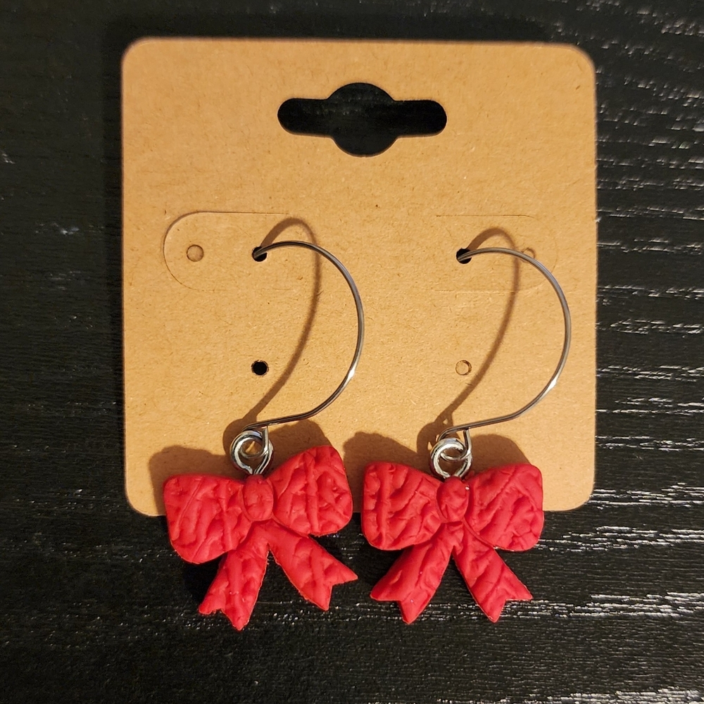 Red clay bow earrings